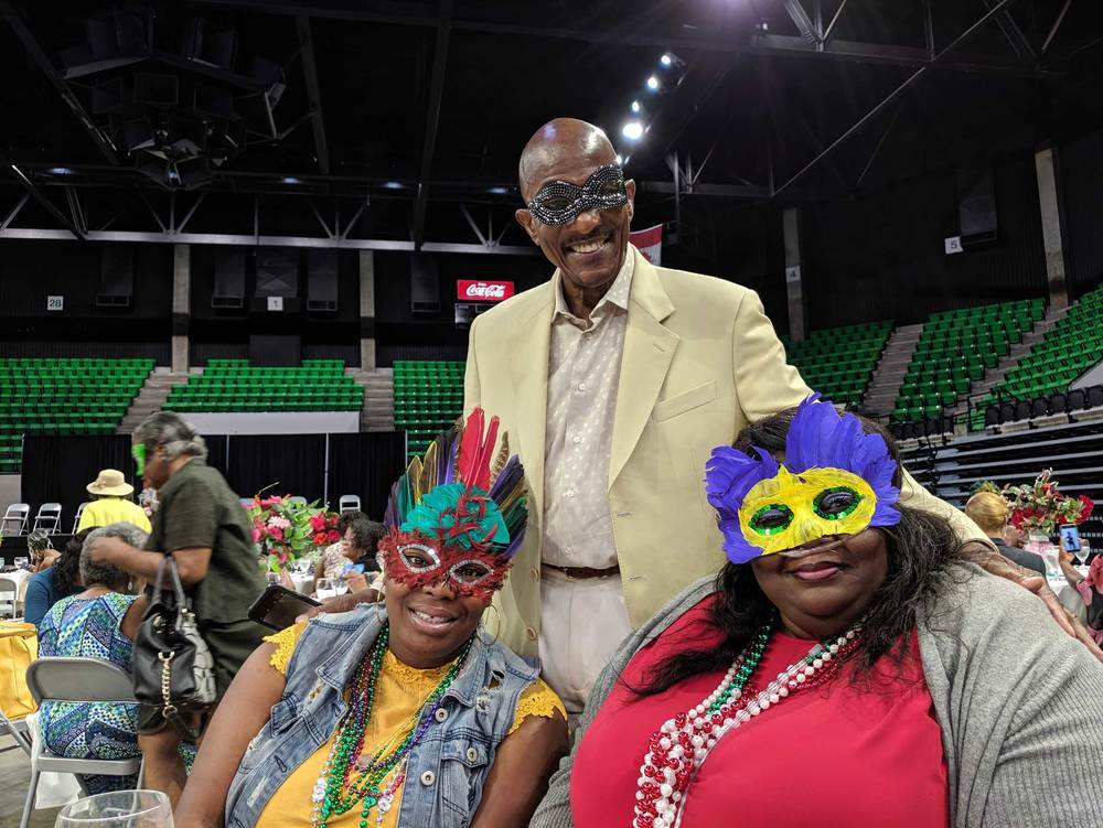 Resident Advisory Board Members at Conference Mardi Gras Theme