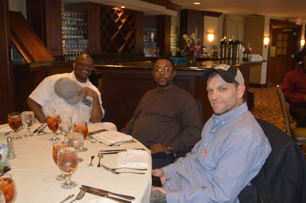 maintenance staff at holiday luncheon in lha newsletter