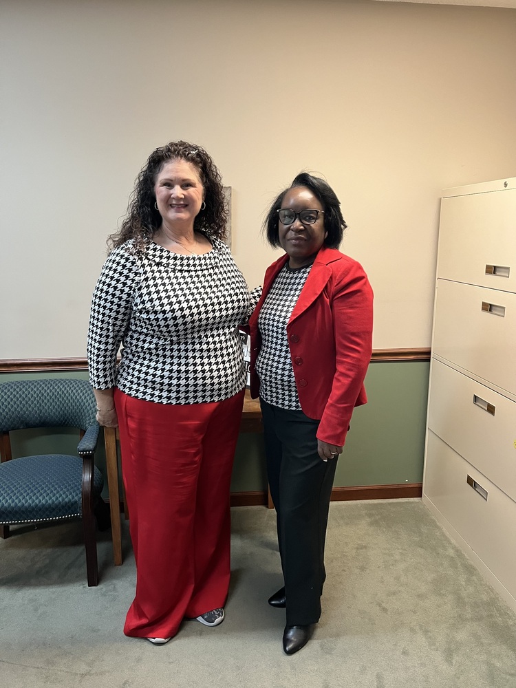 Sylvia Impson and Mary Cameron dressed like twins.