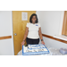 ceo sharon tolbert behind cake