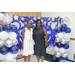 auburn high school graduation reception attendees in front of backdrop and balloons