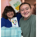 Charlotte Mattox and Bravehearts volunteer posed with blanket and card