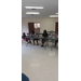 Bingo participants at table at a distance