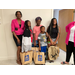 Mother with four kids posing with bags of school supplies