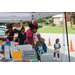 Youth looking at school supplies on table