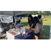 Attendees at vendor table at National Night Out