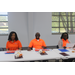 Auburn Housing Authority Employee sitting at desk looking at camera 